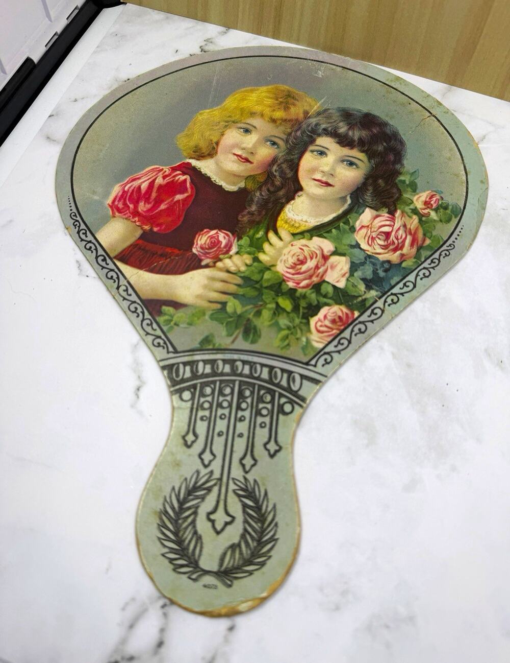 Art Deco Antique Die Cut Cardboard Hand Fan Two Girls Roses Advertising Ephemera